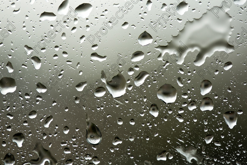 6H1C0581 
 Rain drops on window 
 Keywords: abstract, aqua, background, beverage, bubble, clean, clear, closeup, drop, droplet, environment, flow, glass, glossy, liquid, macro, moisture, nature, pattern, perfection, pure, rain, raindrop, relax, relaxation, ripple, shape, smooth, splash, surface, symbol, texture, transparent, wallpaper, wash, water, weather, wet, white, window