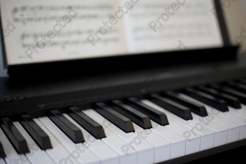 Piano-006 
 Piano and sheet music