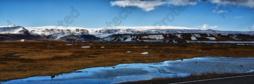 0603 back from Vik full res 
 Icelandic Landscape Panorama 
 Keywords: Landscape, Iceland, Mountain, Winter, Sun, Sunny , Beauty In Nature, Cloud, Cloudscape, Journey, Vacations, Travel Destinations, Panorama