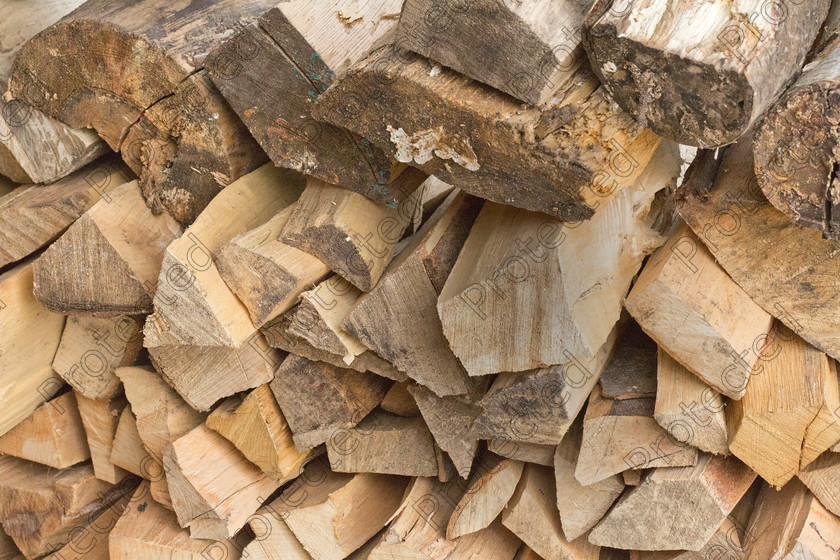 Wood-001 
 Chipped wood for fire 
 Keywords: beech, cutting, felling, fir, fire, firewood, firing, flora, forest, fuel, heating, log, lumber, nature, product, products, sledge, store, timber, tree, wood