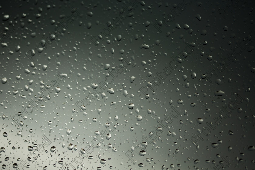 6H1C0576 
 Rain drops on window 
 Keywords: abstract, aqua, background, beverage, bubble, clean, clear, closeup, drop, droplet, environment, flow, glass, glossy, liquid, macro, moisture, nature, pattern, perfection, pure, rain, raindrop, relax, relaxation, ripple, shape, smooth, splash, surface, symbol, texture, transparent, wallpaper, wash, water, weather, wet, white, window