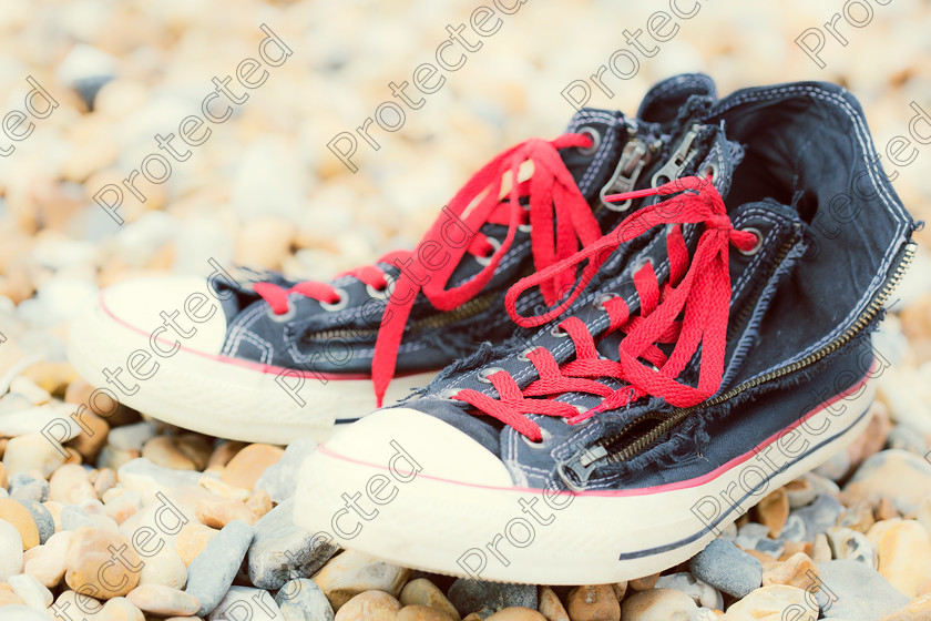 6H1C9986 
 Trainers on pebble beach 
 Keywords: navy, blue, red, trainer, Footwear, Grass, Green, Urban Scene, City Life, Fashion, White, Sport, Funky, Youth Culture, Cool, Modern, Fashionable, Lifestyles, Textured Effect, Spring, Moving Up, Label, Freedom, Pair, Foot, Rubber, Child, Close-Up, Beach, Stone, Stone, Pebble, New