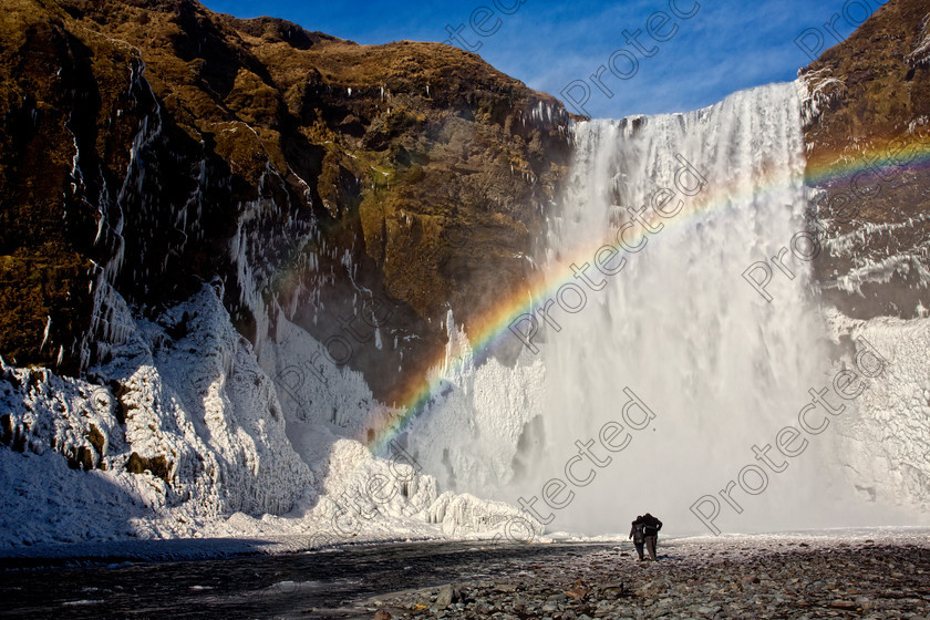 1301 Skogafoss full res 
 Skogafoss waterfall 
 Keywords: Iceland, Waterfall, Skogafoss Waterfall, Distant, Nature, Winter, Cold, Frozen, Ice, Water, rainbow