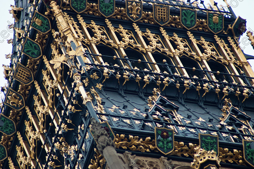 UK London DSC 0162 
 Close up shot of the Big Ben Tower showing fine detail 
 Keywords: architecture, art, beautiful, ben, big, bright, Britain, british, building, clock, close-up, closeup, detail, England, english, history, houses, kingdom, landmark, London, monument, old, palace, parliament, sightseeing, sky, time, tourism, tourist, tower, travel, United Kingdom, view, Westminster, yellow