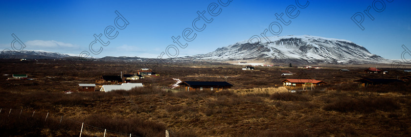 0702 Icelandic landscape full res 
 Icelandic Landscape 
 Keywords: mountain, iceland, landscape, snow, ice, winter, huts, houses, clear sky, cloudless
