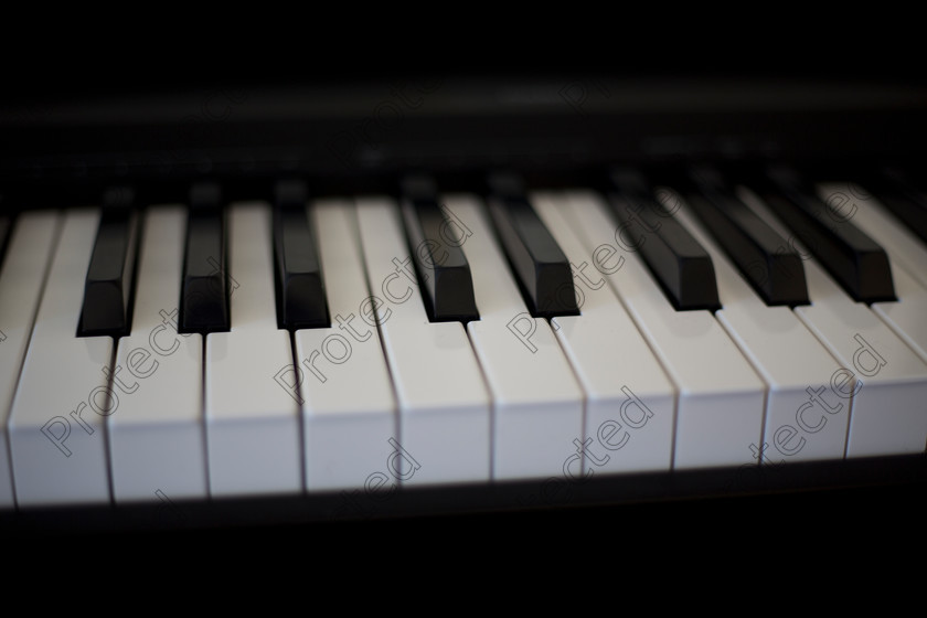 Piano-004 
 Piano and sheet music 
 Keywords: monochrome
