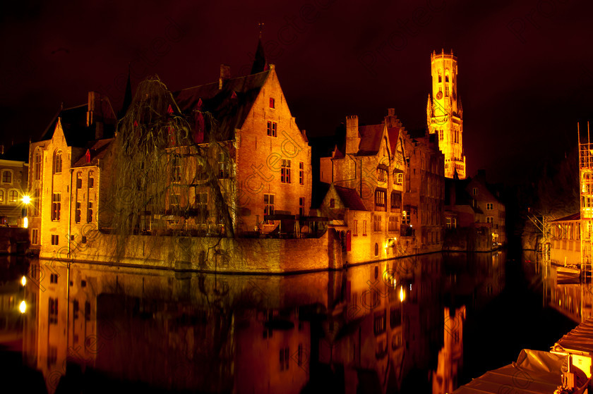 DSC 0900 
 Brugge by night 
 Keywords: architecture, belfry, belgian, belgium, bruges, brugge, buildings, city, dark, europe, flanders, flemish, historic, houses, illuminated, illumination, late, lit, medieval, night, old, quaint, reflection, romantic, scenic, style, tourism, tower, town, travel, water, waterfront