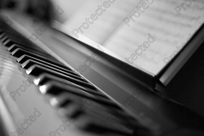 Piano-024 
 Piano and sheet music 
 Keywords: monochrome