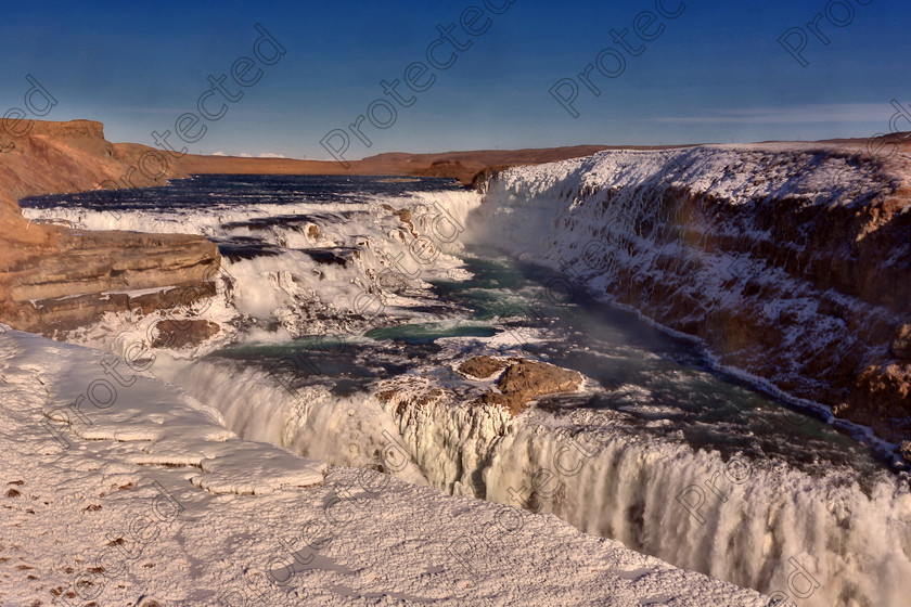 0801 Gullfoss full res 
 Gullfoss waterfall, Iceland 
 Keywords: gullfoss, waterfall, winter, iced, icy, frozen, gold, golden, iceland, river, famous, flow, falls,