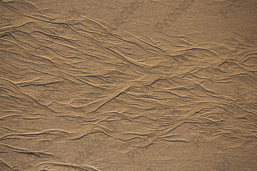 6H1C1982 
 Patterns in sand 
 Keywords: sand, background, texture, ripple, nature, beach, pattern, summer, white, travel, orange, dunes, wave, hot, dry, arid, dune, sea, yellow, water, brown, landscape, abstract, lines