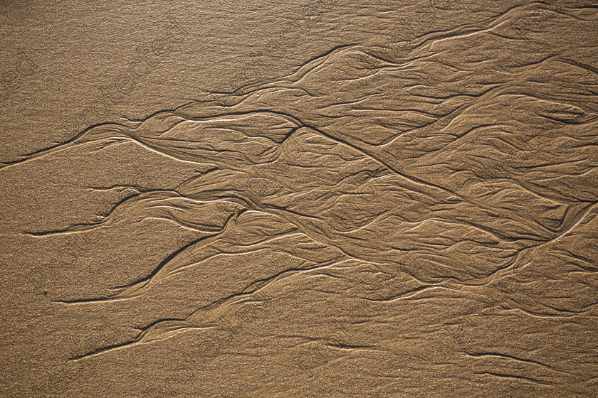6H1C1983 
 Patterns in sand 
 Keywords: sand, background, texture, ripple, nature, beach, pattern, summer, white, travel, orange, dunes, wave, hot, dry, arid, dune, sea, yellow, water, brown, landscape, abstract, lines