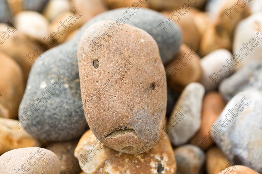 Pebble-001 
 Pebble with sad face 
 Keywords: Backdrop, Backgrounds, Beach, Beauty, Beauty In Nature, Brown, Concepts, Human Face, Fun, Happiness, Smiling, Vacations, Horizontal, Landscape, Old, Relaxation, Rock, Sand, Season, Sign, Stone, Stone, Summer, Symbol, Textured Effect, Textured, Travel, Wallpaper, Pebble, Depression, Sadness