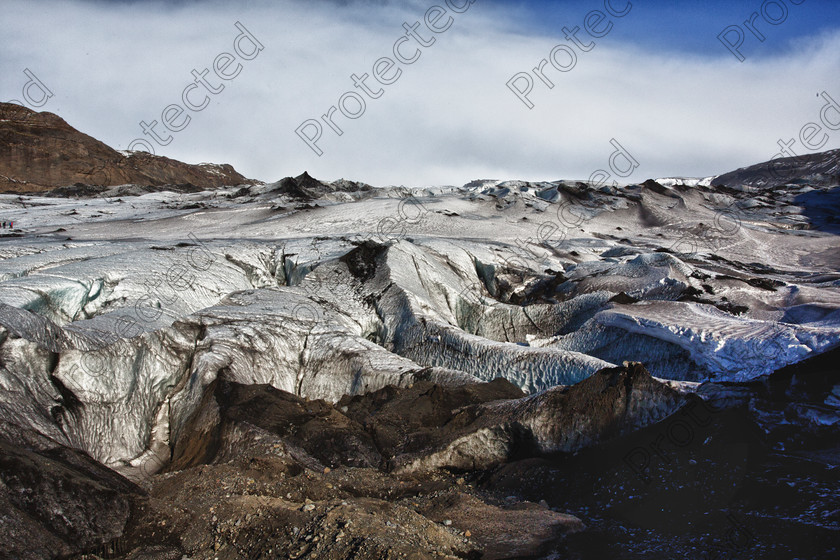 1205 Glacier full res 
 Solheimajkull Glacier, Iceland 
 Keywords: Solheimajkull, Glacier, Iceland, Cold, Ice, Tundra, Mountain, Ash, Sky, Sun, Sunny , Landscape